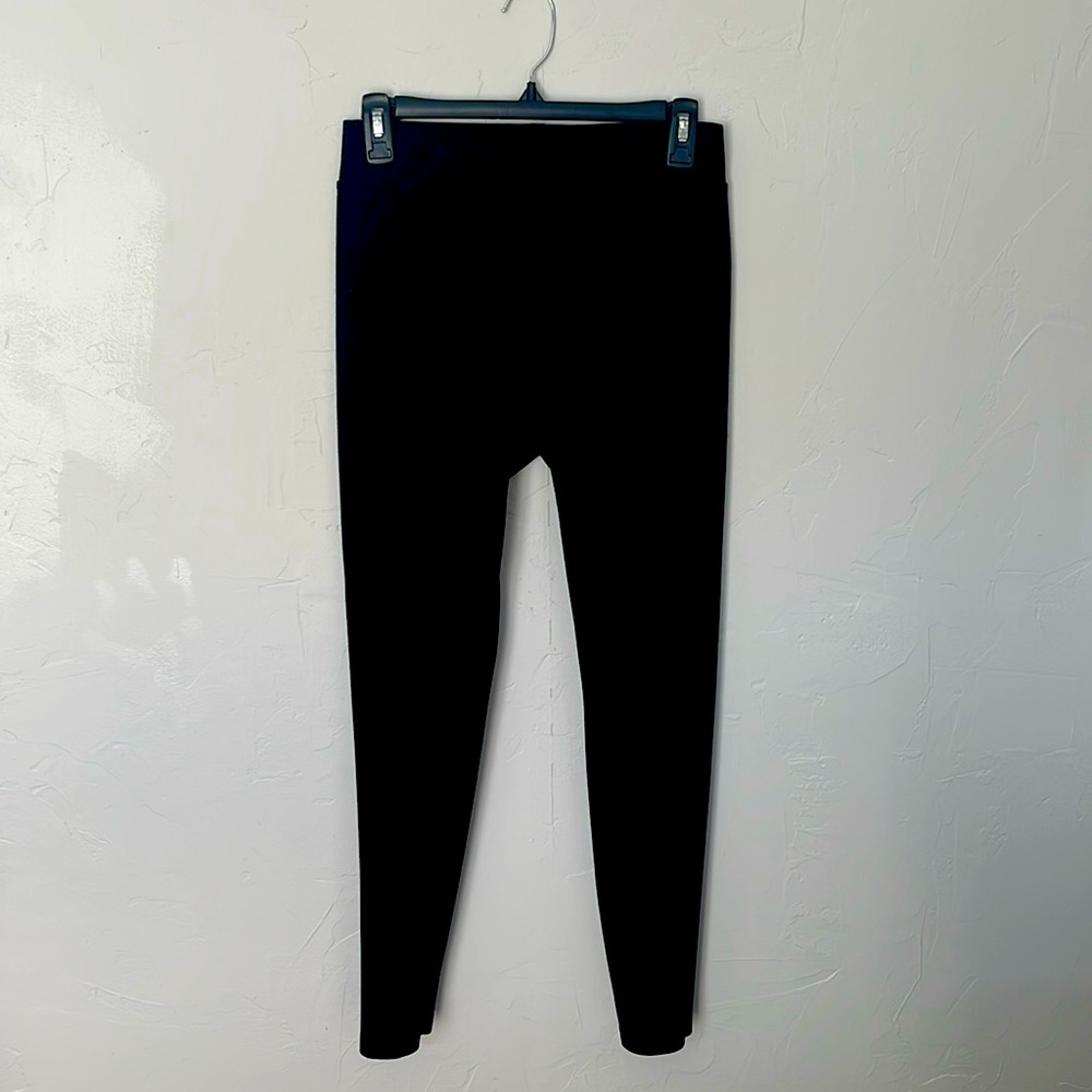 Women’s black stretch pants.  Medium